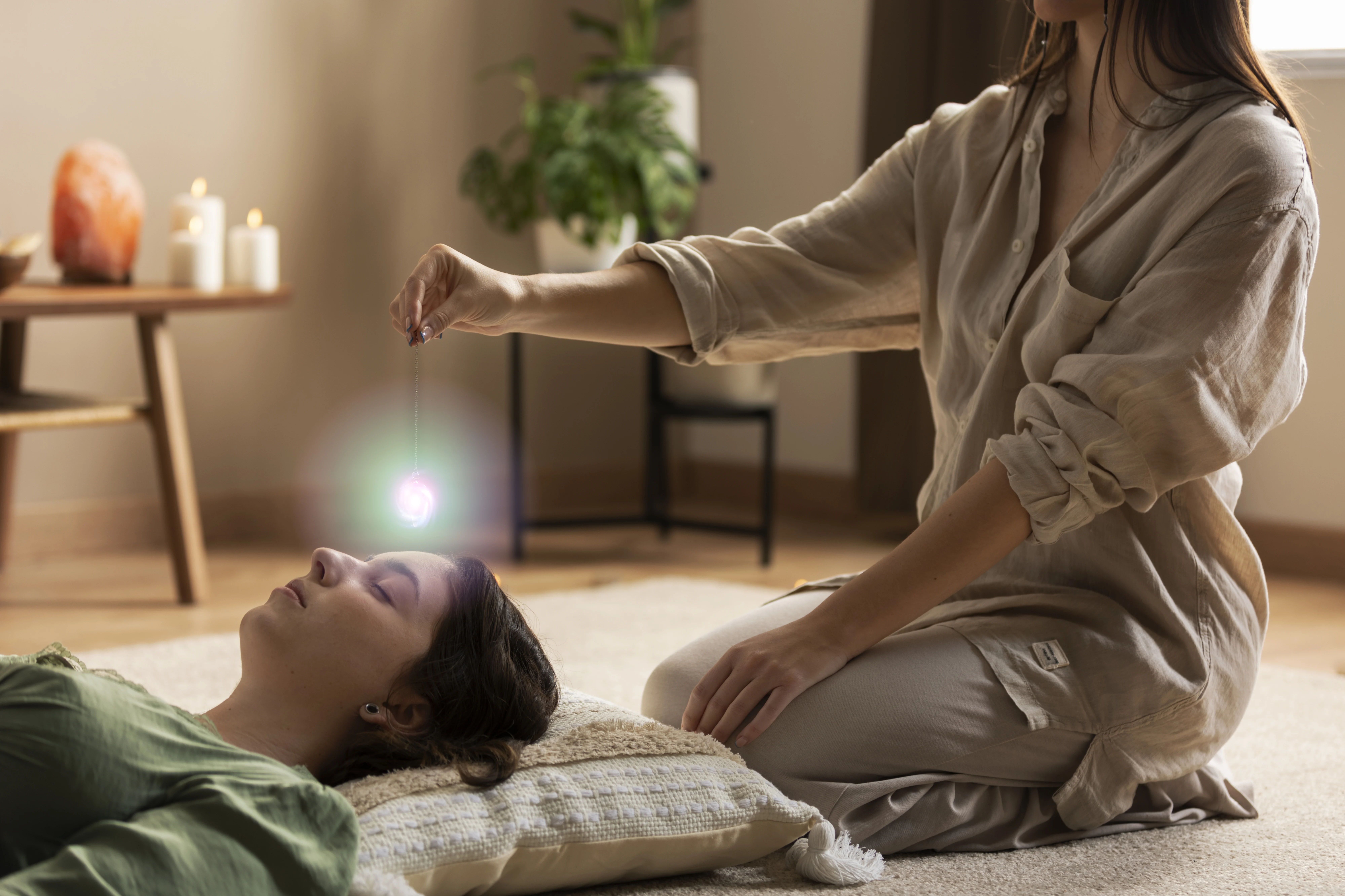 Shiatsu therapist applying palm pressure along the back