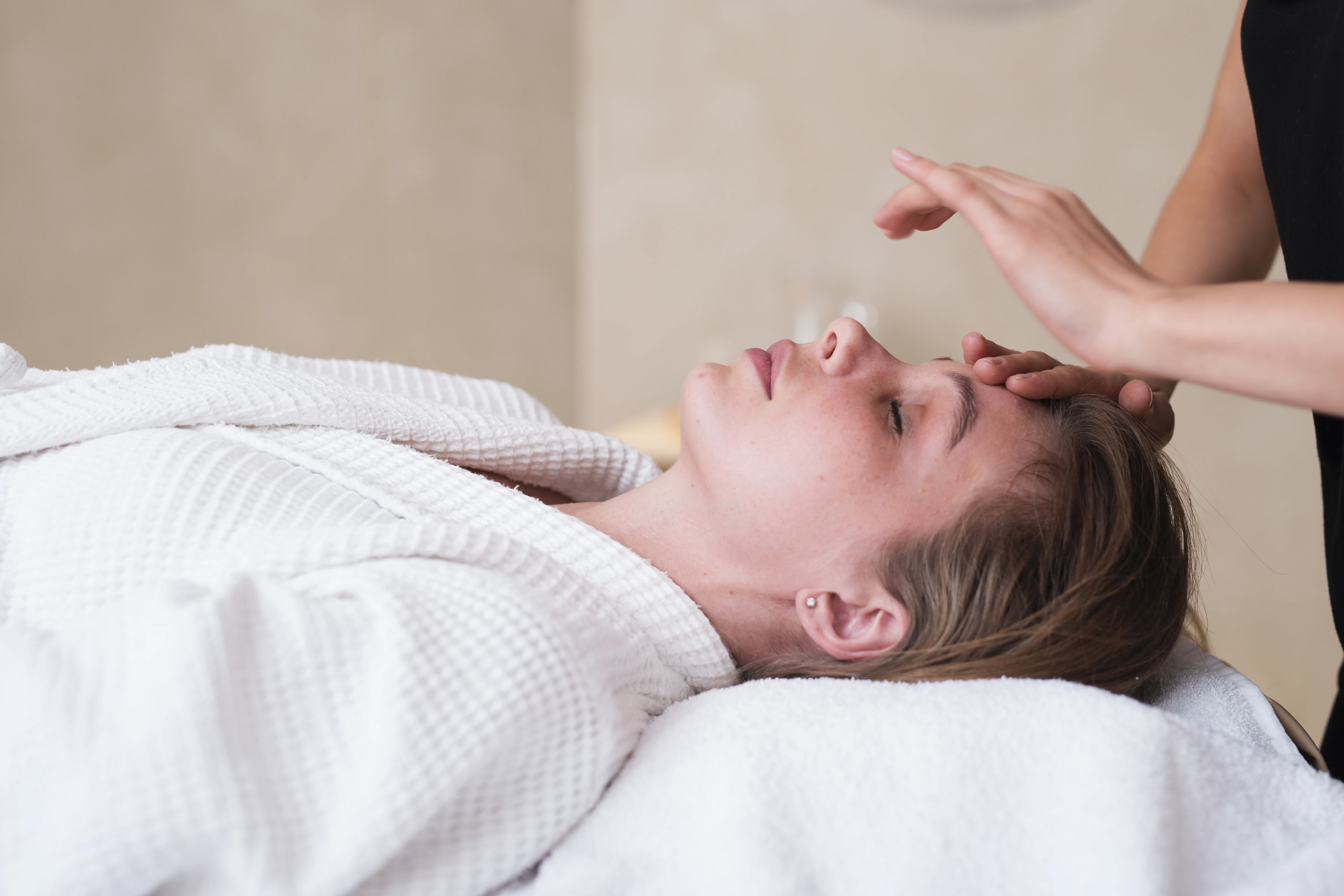 Relaxed client receiving zone therapy treatment